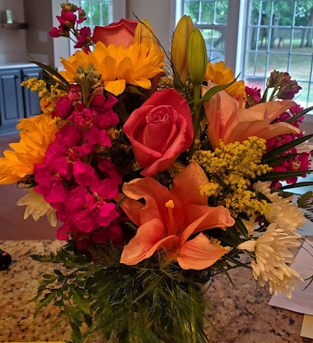 Mattie-Lous-Flower-and-Gift.jpg